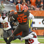 Cleveland Browns tight end David Njoku (85) catches a pass from quarterback Jacoby Brissett for a touchdown during the second half of an NFL football game against the Tampa Bay Buccaneers in Cleveland, Sunday, Nov. 27, 2022. (AP Photo/Ron Schwane)