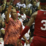 Louisville head coach Kenny Payne instructs his team against Arkansas during the first half of an NCAA college basketball game, Monday, Nov. 21, 2022, in Lahaina, Hawaii. (AP Photo/Marco Garcia)