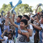 
              Argentina soccer fans celebrate their team's 2 - 0 victory over Mexico at the end of the World Cup match, hosted by Qatar, in Buenos Aires, Argentina, Saturday, Nov. 26, 2022. (AP Photo/Gustavo Garello)
            