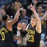 
              Utah Jazz's Lauri Markkanen (23) celebrates with Talen Horton-Tucker (0) after scoring against the Los Angeles Lakers during the second half of an NBA basketball game Monday, Nov. 7, 2022, in Salt Lake City. (AP Photo/Rick Bowmer)
            