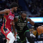 
              Boston Celtics guard Jaylen Brown (7) drives to the basket against New Orleans Pelicans forward Naji Marshall in the second half of an NBA basketball game in New Orleans, Friday, Nov. 18, 2022. The Celtics won 117-109. (AP Photo/Gerald Herbert)
            