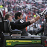 Washington State offensive lineman Ma'ake Fifita (66) gestures as he is carted off the field after an injury during the second half of an NCAA college football game against Arizona State, Saturday, Nov. 12, 2022, in Pullman, Wash. Washington State won 28-18. (AP Photo/Young Kwak)