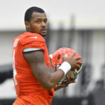 
              Cleveland Browns quarterback Deshaun Watson stands on the field during an NFL football practice at the team's training facility Wednesday, Nov. 30, 2022, in Berea, Ohio. (AP Photo/David Richard)
            