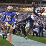 
              Syracuse wide receiver D'Marcus Adams (85) fails to catch a pass in front of Pittsburgh defensive back M.J. Devonshire (12) during the first half of an NCAA college football game, Saturday, Nov. 5, 2022, in Pittsburgh. (AP Photo/Barry Reeger)
            