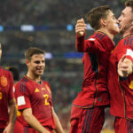 
              Spain's Gavi, second right, celebrates with Aymeric Laporte after scoring his side's fifth goal during the World Cup group E soccer match between Spain and Costa Rica, at the Al Thumama Stadium in Doha, Qatar, Wednesday, Nov. 23, 2022. (AP Photo/Pavel Golovkin)
            