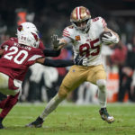
              San Francisco 49ers tight end George Kittle, right, gets past Arizona Cardinals cornerback Marco Wilson (20) and safety Budda Baker, on his way to scoring a touchdown during the first half of an NFL football game Monday, Nov. 21, 2022, in Mexico City. (AP Photo/Fernando Llano)
            
