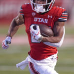 Utah wide receiver Jaylen Dixon (25) carries the ball for a touchdown during the first half of an NCAA college football game against Arizona Saturday, Nov. 5, 2022, in Salt Lake City. (AP Photo/Rick Bowmer)