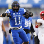 
              Kentucky defensive back Zion Childress celebrates getting a stop against Louisville during the first half of an NCAA college football game in Lexington, Ky., Saturday, Nov. 26, 2022. (AP Photo/Michael Clubb)
            
