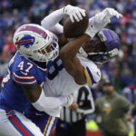 
              Buffalo Bills cornerback Christian Benford (47) brings down Minnesota Vikings wide receiver Justin Jefferson (18) in the first half of an NFL football game, Sunday, Nov. 13, 2022, in Orchard Park, N.Y. (AP Photo/Joshua Bessex)
            