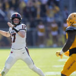 
              Oregon State quarterback Ben Gulbranson looks to throw the ball as Arizona State defensive lineman B'Ahmad Miller applies pressure during the first half of an NCAA college football game in Tempe, Ariz., Saturday, Nov. 19, 2022. (AP Photo/Ross D. Franklin)
            
