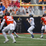 West Virginia quarterback Garrett Greene (6) passes the ball during the first quarter the NCAA college football game against Oklahoma State in Stillwater, Okla., Saturday Nov. 26, 2022. (AP Photo/Mitch Alcala)