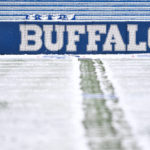 FILE - Snow covers the field at Highmark Stadium before an NFL football game between the Atlanta Falcons and Buffalo Bills in Orchard Park, N.Y., on Sunday, Jan. 2, 2022. The NFL is monitoring the weather and has contingency plans in place in the event a lake-effect snowstorm hitting the Buffalo disrupts the Bills ability to host the Cleveland Browns on Sunday, Nov. 20, 2022. (AP Photo/Adrian Kraus, File)