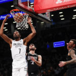 Brooklyn Nets forward Kevin Duran (7) dunks against the Memphis Grizzlies during the first half of an NBA basketball game Sunday, Nov. 20, 2022, in New York. (AP Photo/Eduardo Munoz Alvarez)