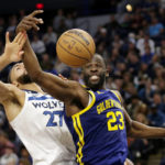 
              Golden State Warriors forward Draymond Green (23) and Minnesota Timberwolves center Rudy Gobert (27) vie for a rebound in the second quarter of an NBA basketball game Sunday, Nov. 27, 2022, in Minneapolis. (AP Photo/Andy Clayton-King)
            