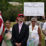 
              Families and survivors of the 9/11 terror attacks attend a news conference near the site of the Bedminster Invitational LIV Golf tournament in Bedminster, NJ., Friday, July 29, 2022. Like the Saudi-backed LIV Golf league, critics describe the 2022 World Cup, which starts Sunday, as a classic case of “sportswashing” — using sports to change a country or company's image. (AP Photo/Seth Wenig, File)
            