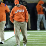 
              Clemson head coach Dabo Sweeney walks the sideline near the end of an NCAA college football game against Notre Dame Saturday, Nov. 5, 2022, in South Bend, Ind. Notre Dame won 35-14. (AP Photo/Charles Rex Arbogast)
            