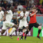 
              Belgium's Kevin De Bruyne, right, runs with the ball during the World Cup group F soccer match between Belgium and Canada, at the Ahmad Bin Ali Stadium in Doha, Qatar, Wednesday, Nov. 23, 2022. (AP Photo/Natacha Pisarenko)
            