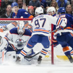 
              Edmonton Oilers goaltender Jack Campbell (36) makes a save against New York Islanders center Brock Nelson (29) during the first period of an NHL hockey game Wednesday, Nov. 23, 2022, in Elmont, N.Y. (AP Photo/John Minchillo)
            