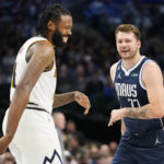 
              Denver Nuggets center DeAndre Jordan (6) and Dallas Mavericks guard Luka Doncic (77) laugh after they bumped into each other during the first quarter of an NBA basketball game in Dallas, Sunday, Nov. 20, 2022. (AP Photo/LM Otero)
            