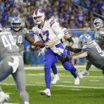 Buffalo Bills quarterback Josh Allen (17) runs into the end zone for a 3-yard touchdown during the first half of an NFL football game against the Detroit Lions, Thursday, Nov. 24, 2022, in Detroit. (AP Photo/Paul Sancya)