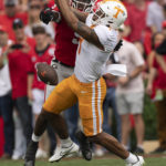Georgia defensive back Jaheim Singletary (9) breaks up a pass intended for Tennessee wide receiver Cedric Tillman (4) during the first half of an NCAA college football game Saturday, Nov. 5, 2022 in Athens, Ga. (AP Photo/John Bazemore)