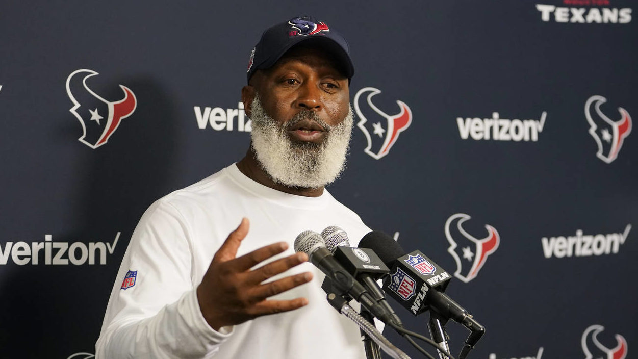 Houston Texans head coach Lovie Smith gestures during a post game news conference after an NFL foot...