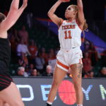 
              In a photo provided by Bahamas Visual Services, Texas' Sonya Morris looks to shoot against Louisville during an NCAA college basketball game in the Battle 4 Atlantis at Paradise Island, Bahamas, Sunday, Nov. 20, 2022. (Tim Aylen/Bahamas Visual Services via AP)
            