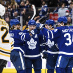 
              Toronto Maple Leafs celebrate after forward Auston Matthews (34) scored against the Boston Bruins during the second period of an NHL hockey game, Saturday, Nov. 5, 2022 in Toronto. (Christopher Katsarov/The Canadian Press via AP)
            