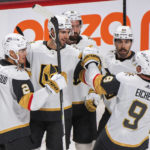 Vegas Golden Knights' Nicolas Hague (14) celebrates with teammates after scoring against the Montreal Canadiens during the first period of an NHL hockey game Saturday, Nov. 5, 2022, in Montreal. (Graham Hughes/The Canadian Press via AP)