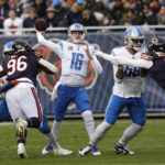 
              Detroit Lions quarterback Jared Goff (16) throws against the Chicago Bears during the first half of an NFL football game in Chicago, Sunday, Nov. 13, 2022. (AP Photo/Charles Rex Arbogast)
            