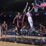 Detroit Pistons' Jaden Ivey (23) drives past New York Knicks' Jalen Brunson (11) during the first half of an NBA basketball game Friday, Nov. 11, 2022, in New York. (AP Photo/Frank Franklin II)