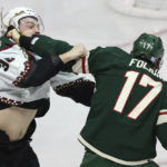 
              Arizona Coyotes center Liam O'Brien and Minnesota Wild left wing Marcus Foligno (17) fight during the second period of an NHL hockey game, Sunday, Nov. 27, 2022, in St. Paul, Minn. (AP Photo/Stacy Bengs)
            