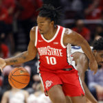 Ohio State forward Brice Sensabaugh, left, chases the ball in front of Robert Morris guard Chris Ford during the second half of an NCAA college basketball game in Columbus, Ohio, Monday, Nov. 7, 2022. (AP Photo/Paul Vernon)