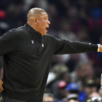 
              Philadelphia 76ers head coach Doc Rivers yells to players during the first half of an NBA basketball game against the Cleveland Cavaliers, Wednesday, Nov. 30, 2022, in Cleveland. (AP Photo/Nick Cammett)
            