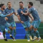 Tottenham's Clement Lenglet, second right, celebrates after scoring his side's first goal during the Champions League Group D soccer match between Marseille and Tottenham Hotspur at the Stade Velodrome in Marseille, France, Tuesday, Nov. 1, 2022. (AP Photo/Daniel Cole)