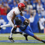 
              Louisville cornerback Quincy Riley (3) tackles Kentucky wide receiver Dane Key (6) during the first half of an NCAA college football game in Lexington, Ky., Saturday, Nov. 26, 2022. (AP Photo/Michael Clubb)
            