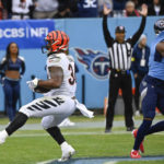 
              Cincinnati Bengals running back Samaje Perine (34) runs into the end zone for a touchdown against the Tennessee Titans during the first half of an NFL football game, Sunday, Nov. 27, 2022, in Nashville, Tenn. (AP Photo/Mark Zaleski)
            
