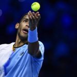 
              Felix Auger-Aliassime serves to Rafael Nadal during their singles tennis match of the ATP World Tour Finals, at the Pala Alpitour in Turin, Italy, Tuesday, Nov. 15, 2022. (Nicolo' Campo/LaPresse via AP)
            