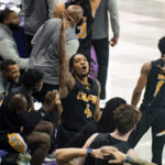 
              Arkansas-Pine Bluff guard Orion Virden (4) shouts after a teammate drilled a 3-point basket in the first half of an NCAA college basketball game against TCU in Fort Worth, Texas, Monday, Nov. 7, 2022. (AP Photo/Emil Lippe)
            