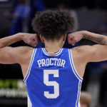 Duke guard Tyrese Proctor (5) reacts after scoring against Kansas during the second half of an NCAA college basketball game, Tuesday, Nov. 15, 2022, in Indianapolis. (AP Photo/Darron Cummings)