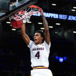 Arizona State's Desmond Cambridge Jr. (4) dunks the ball during the second half of an NCAA college basketball game against Michigan in the championship round of the Legends Classic Thursday, Nov. 17, 2022, in New York. Arizona State won 87-62. (AP Photo/Frank Franklin II)