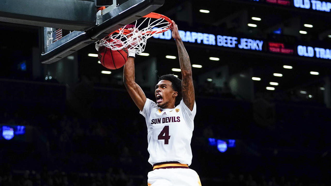 Arizona State's Desmond Cambridge Jr. (4) dunks the ball during the second half of an NCAA college ...