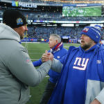 
              New York Giants head coach Brian Daboll, right, and Detroit Lions head coach Dan Campbell, left, meet on the field after an NFL football game, Sunday, Nov. 20, 2022, in East Rutherford, N.J. (AP Photo/John Munson)
            