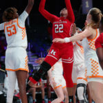 
              In this photo provided by Bahamas Visual Services, Rutgers' Kassondra Brown (22) drives to the basket as Tennessee's Jillian Hollingshead (53) defends during an NCAA college basketball game in the Battle 4 Atlantis in Paradise Island, Bahamas, Saturday, Nov. 19, 2022. (Tim Aylen/Bahamas Visual Services via AP)
            
