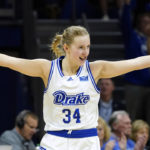 Drake guard Sarah Beth Gueldner (34) celebrates after making a three-point basket during the first half of an NCAA college basketball game against Iowa, Sunday, Nov. 13, 2022, in Des Moines, Iowa. (AP Photo/Charlie Neibergall)