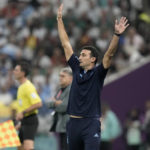 
              Argentina's head coach Lionel Scaloni gestures during the World Cup group C soccer match between Argentina and Mexico, at the Lusail Stadium in Lusail, Qatar, Saturday, Nov. 26, 2022. (AP Photo/Moises Castillo)
            