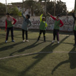 
              Palestinian girls stretch during a soccer training session at the Beit Hanoun Al-Ahli Youth Club's ground in the northern Gaza strip, Tuesday, Oct. 29, 2022. Women's soccer has been long been neglected in the Middle East, a region that is mad for the men's game and hosts the World Cup for the first time this month in Qatar. (AP Photo/Fatima Shbair)
            
