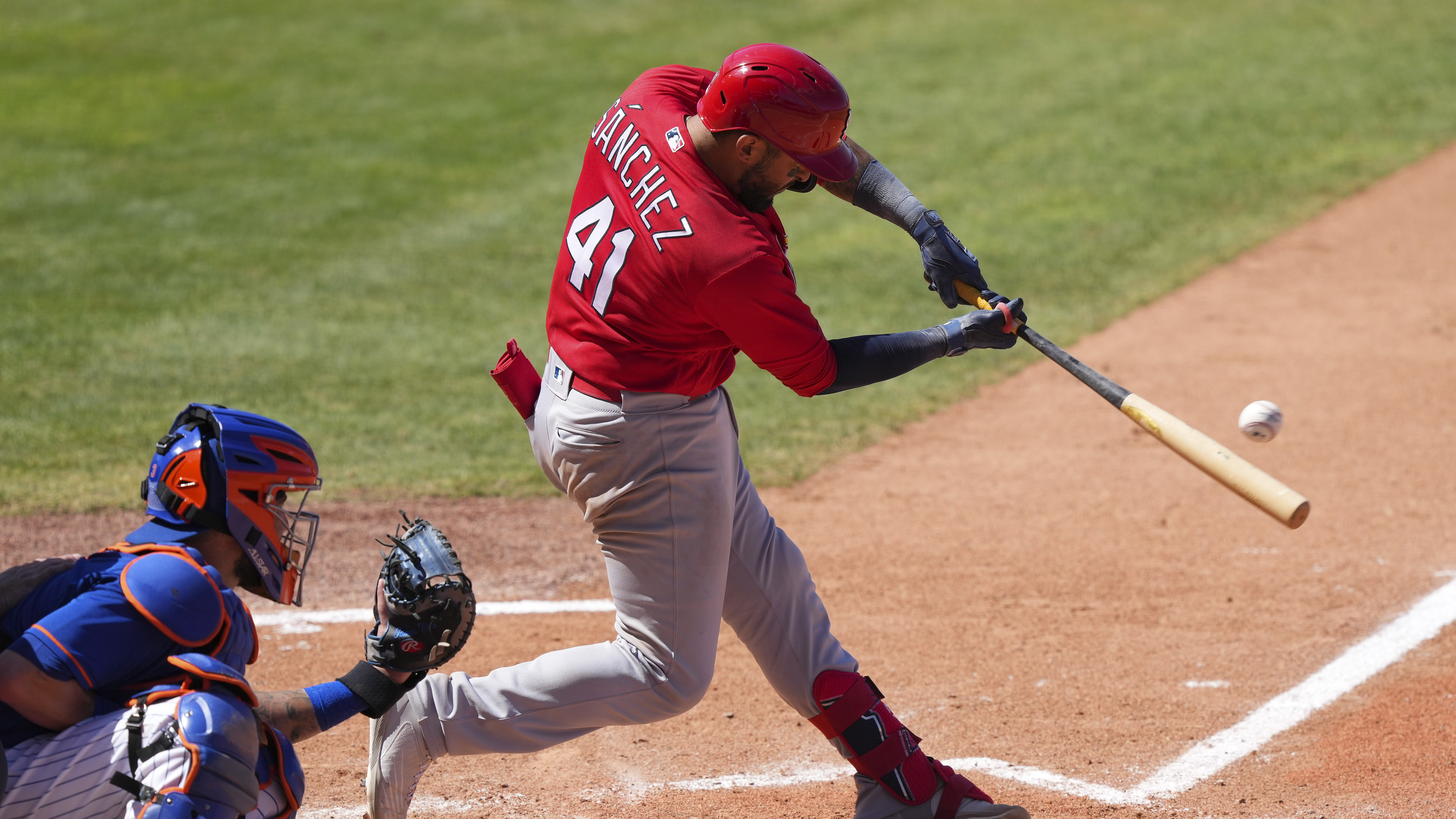 Ali Sanchez #41 of the St. Louis Cardinals hits a double in the seventh inning of the Spring Traini...