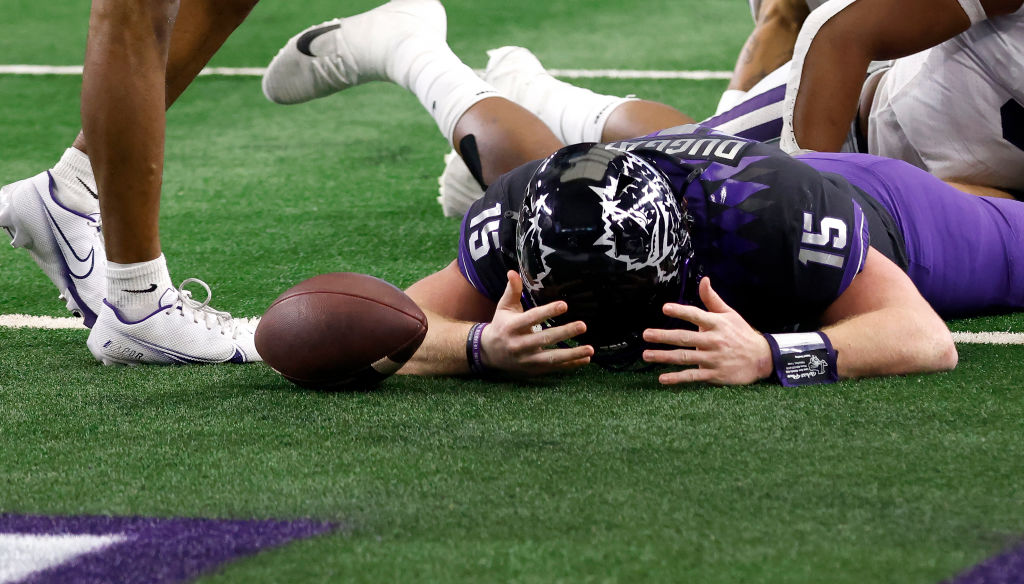 Max Duggan #15 of the TCU Horned Frogs reacts after being called down just short of the goal line i...