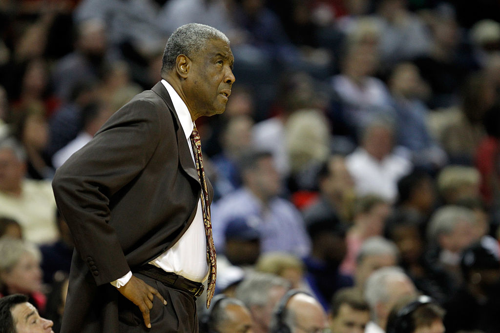 Head coach Paul Silas of the Charlotte Bobcats checks the scoreboard during their game against the ...